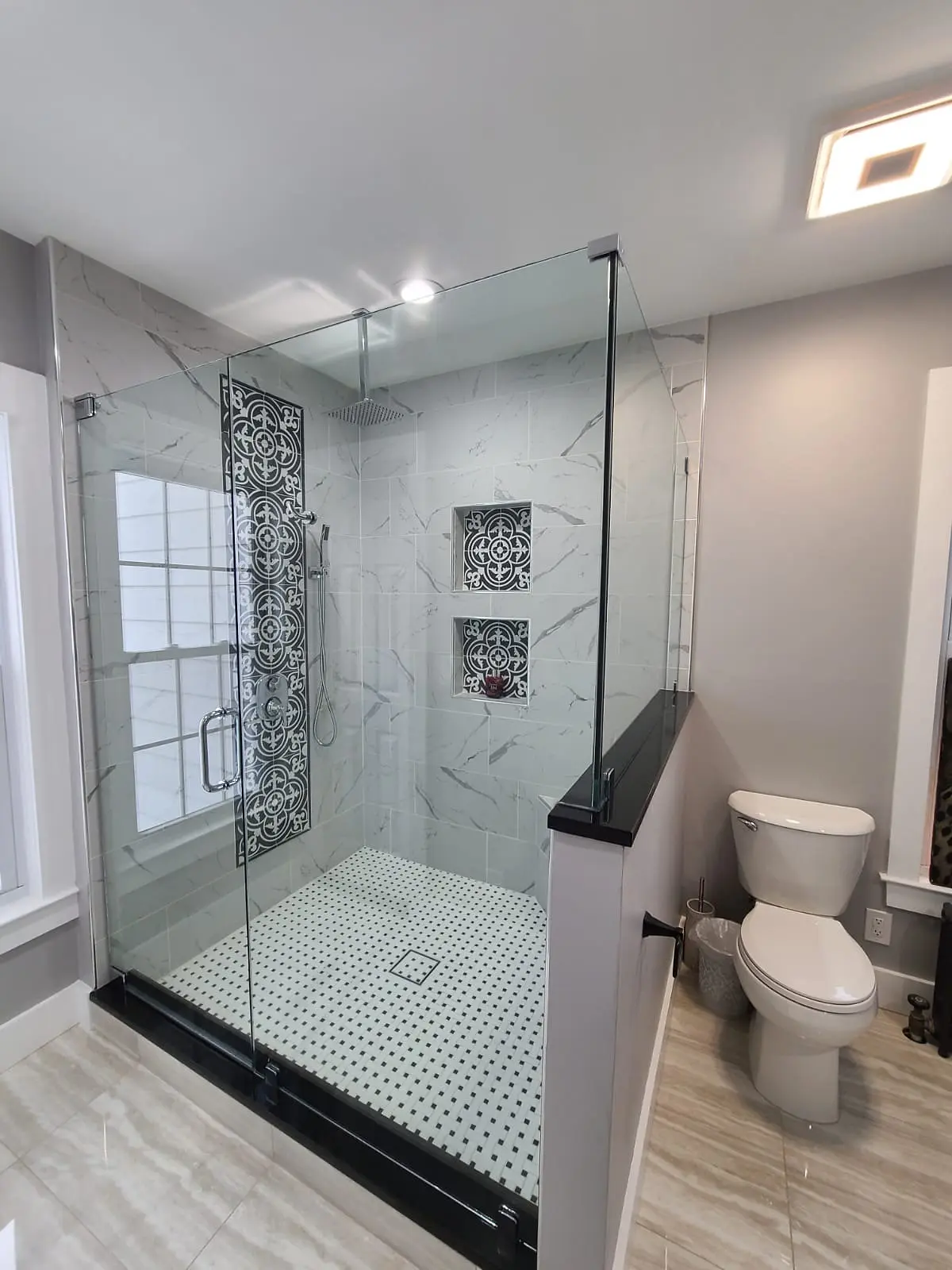 FRAMELESS SHOWER ENCLOSURES